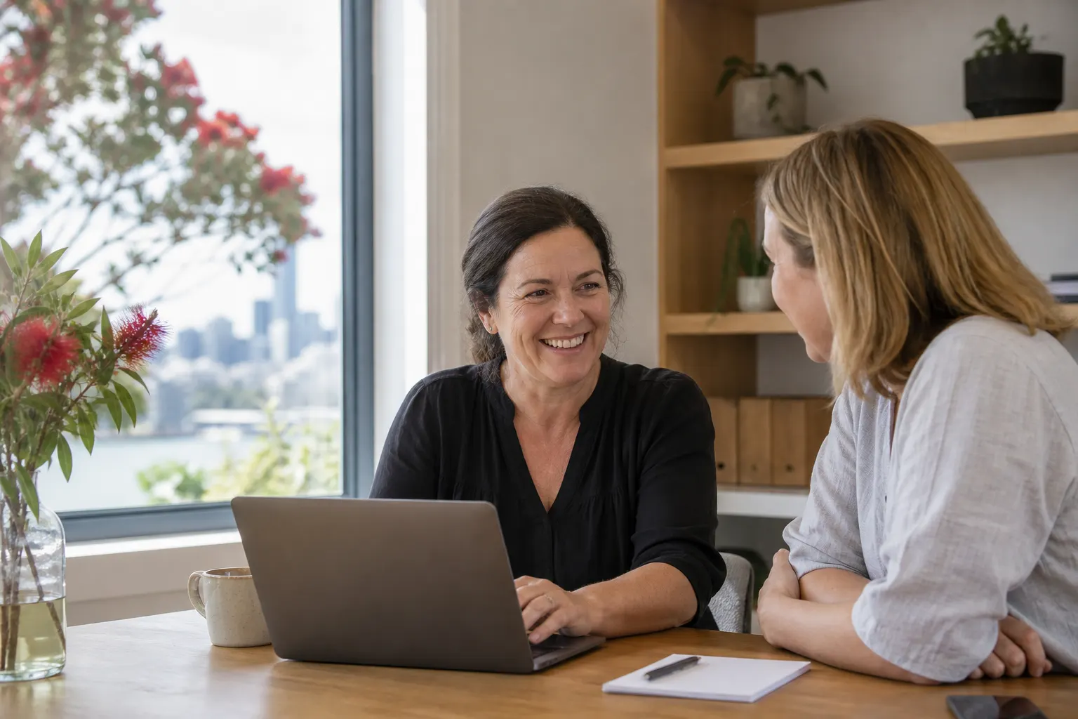 New Zealand administrators enjoying a straightforward custom workflow system in an Auckland office