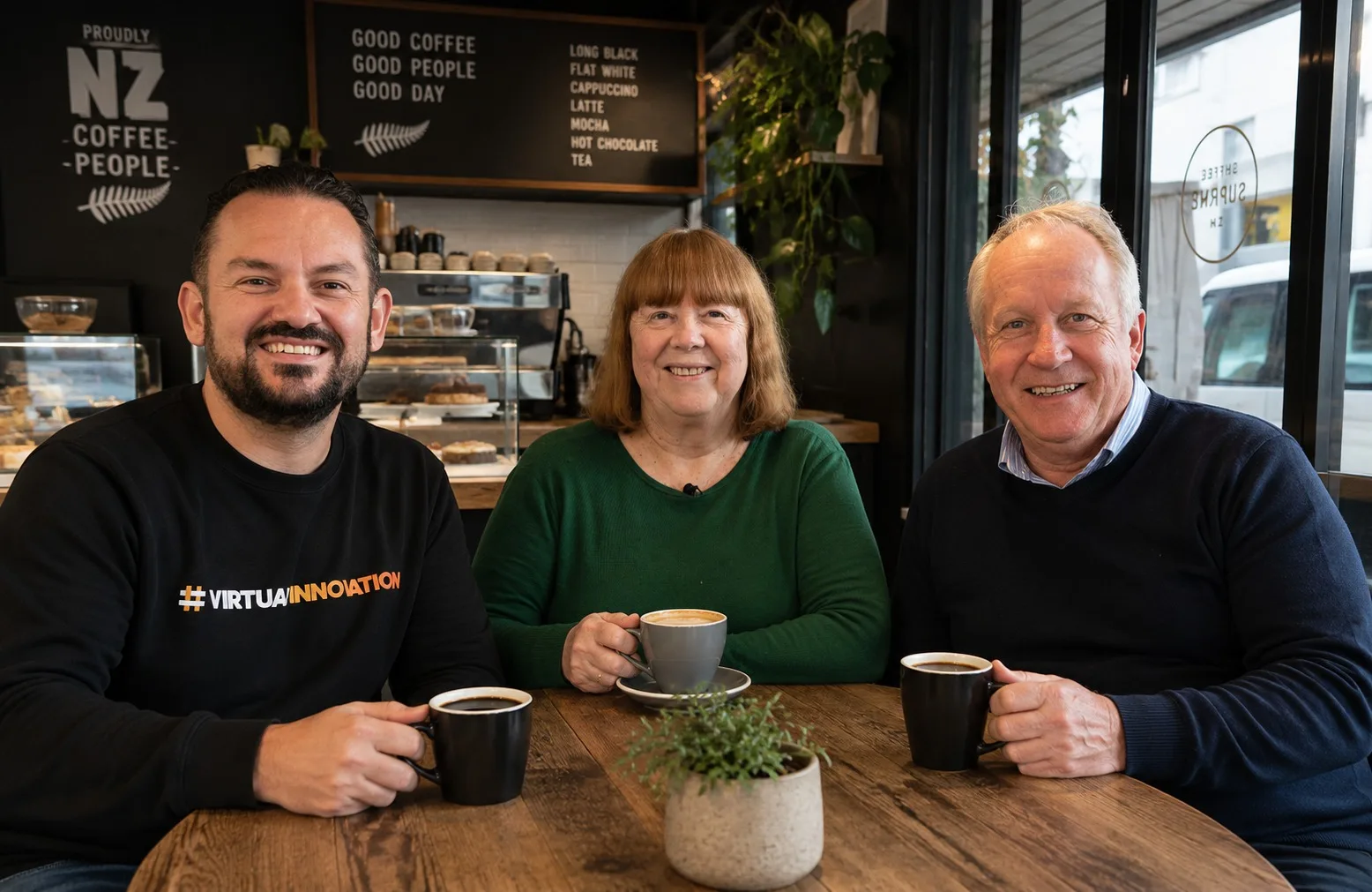 Stephen Martin, Pam Martin and Bryce Heron from Virtual Innovation sharing coffee together in Auckland